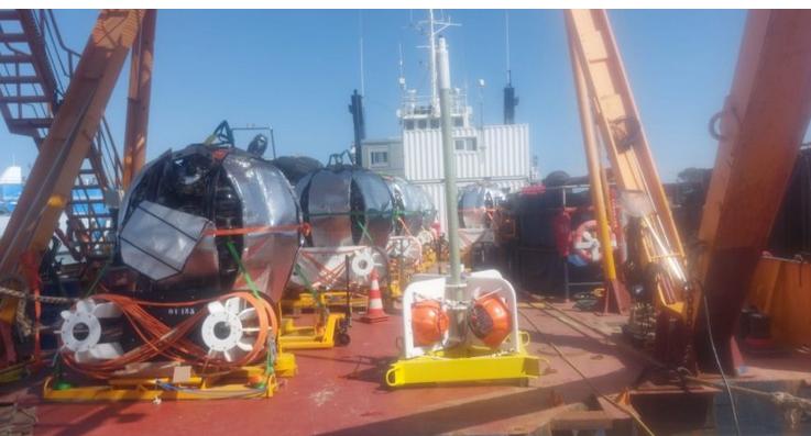 The deck of the Castor 02 packed with detection units and the acoustic tripod